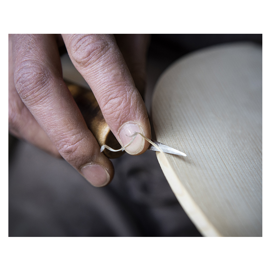 Making Moya's Cello -  The first chamfer of edgework is cut with a knife