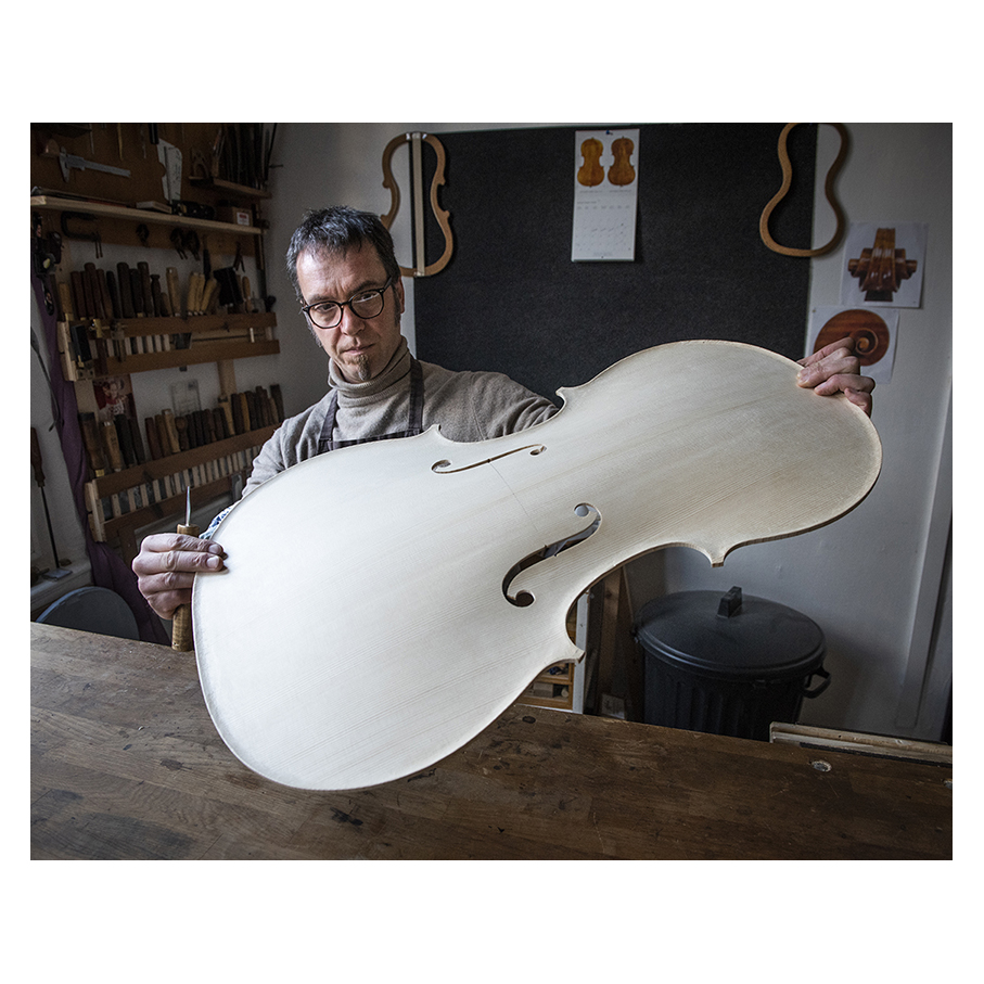 Making Moya's Cello -  The first chamfer of edgework is cut with a knife